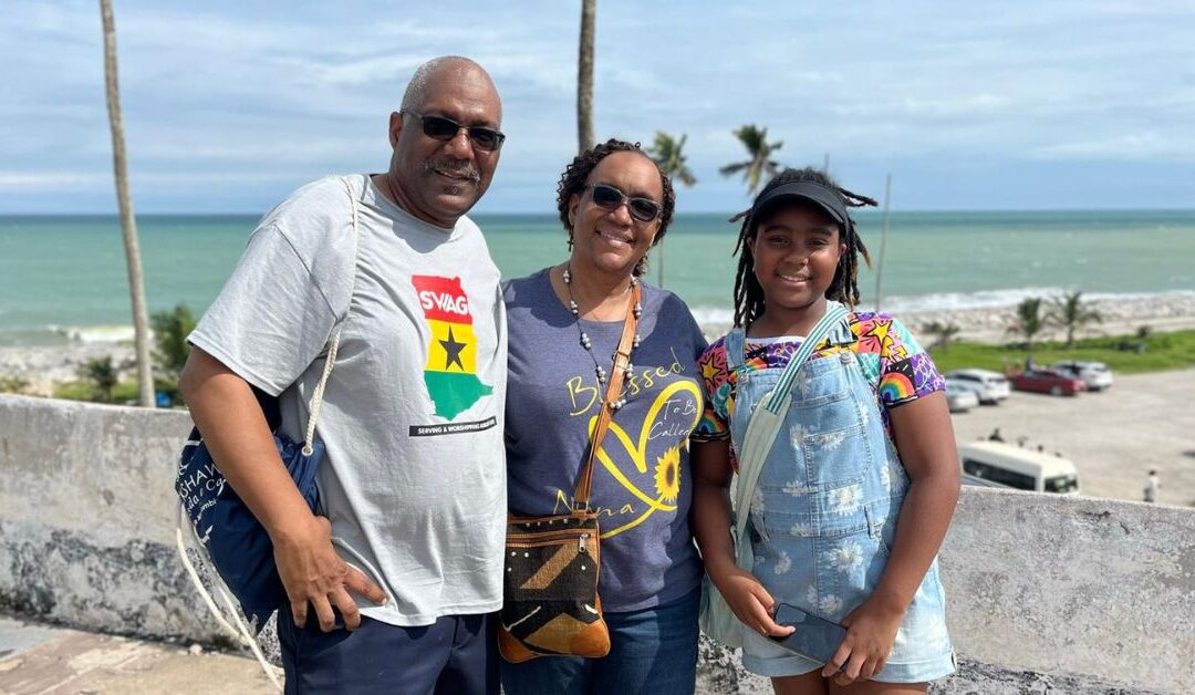 Middle school student and grandparents smiling on missions trip